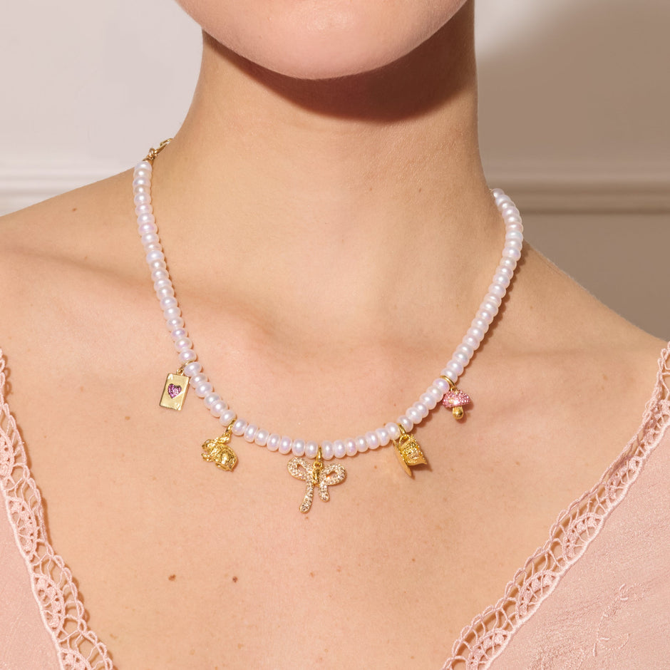 Alice-Inspired Charm Necklace on model