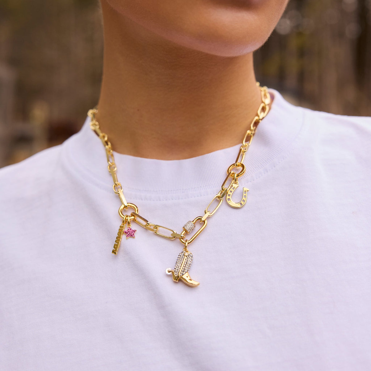 Braided Letter Charm and Ride Boot Charm on model
