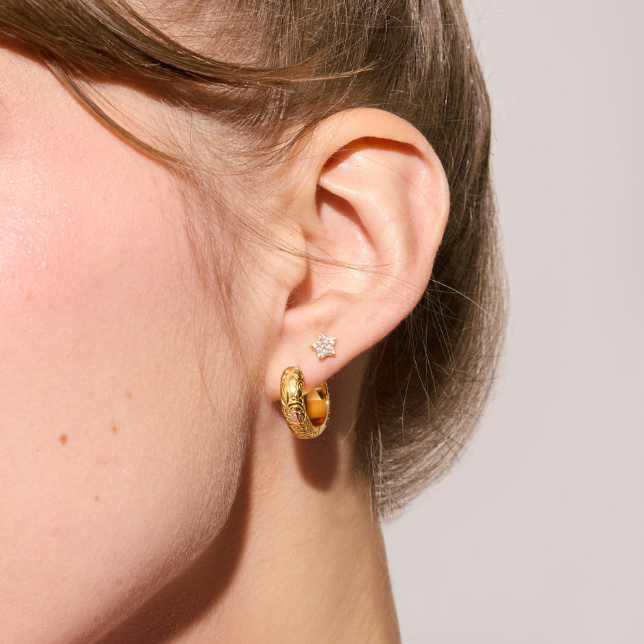 Mini Pavé Star Stud Earrings on model