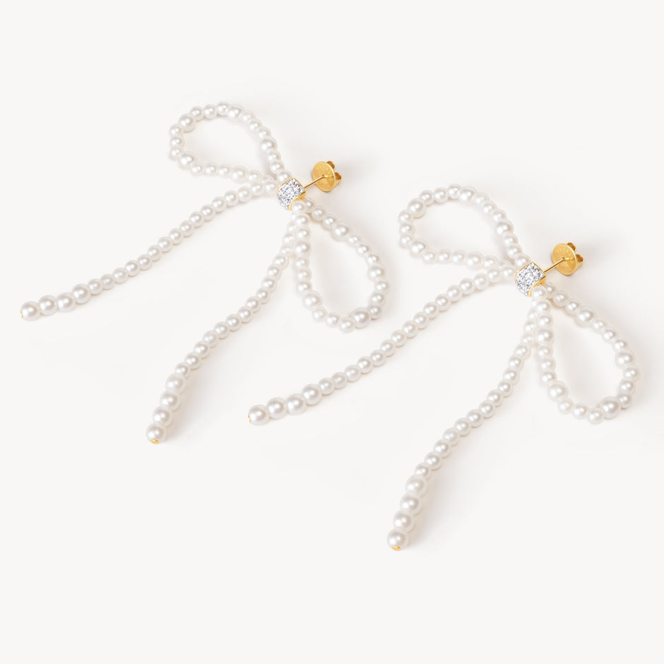 Pearl Present Statement Earrings laying flat
