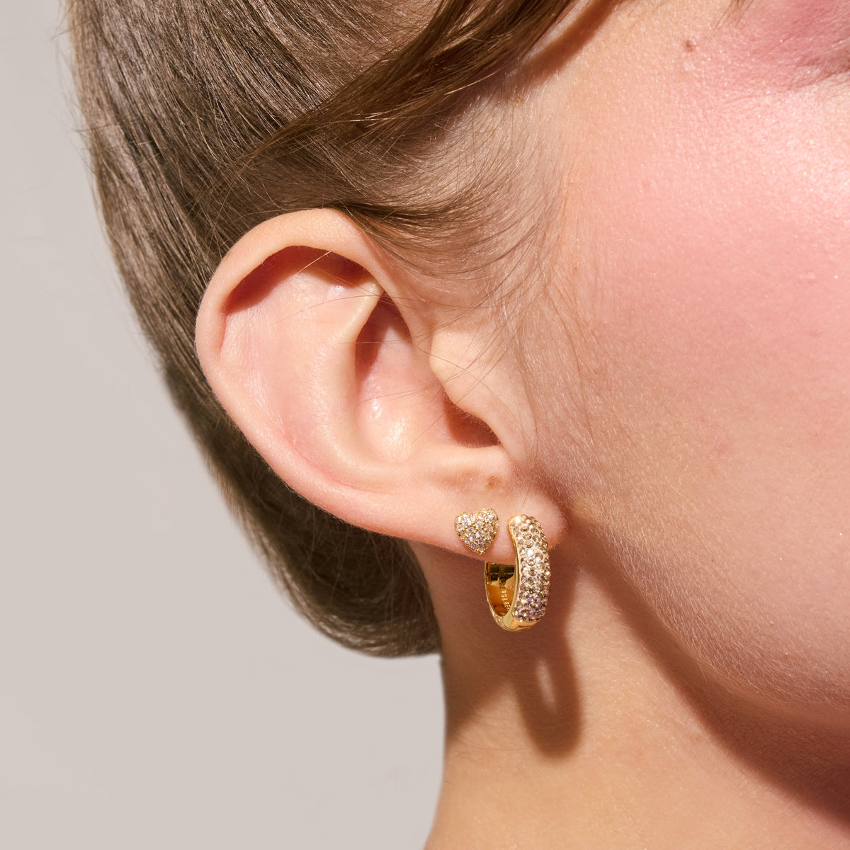 Soft Gold Sparkle Reversible Hoop Earrings Soft Gold side on model