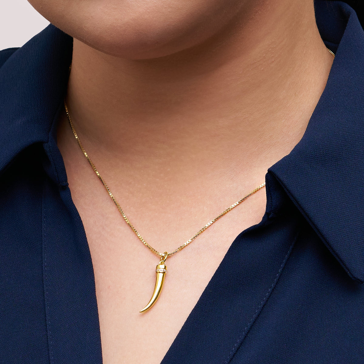 Tusk Charm on model