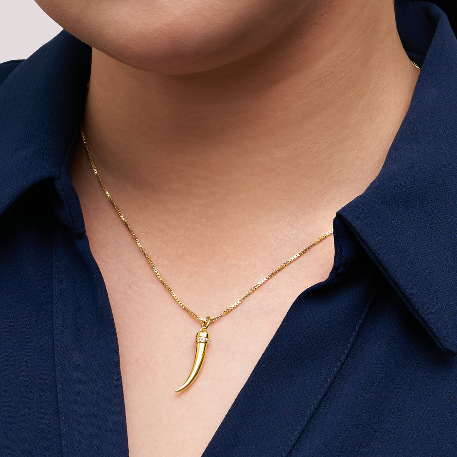 Tusk Charm on model